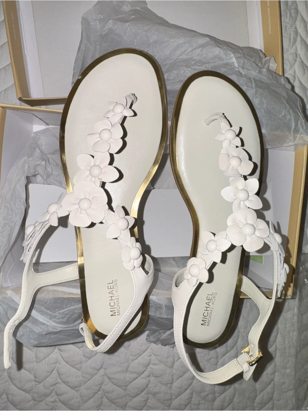 Michael Kors “Tricia” White Floral T-Strap Sandal with Gold Trim